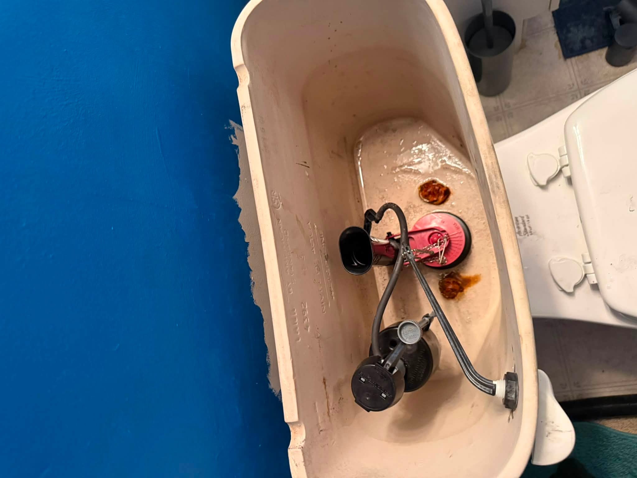 Toilet tank fill valve and flapper repair
